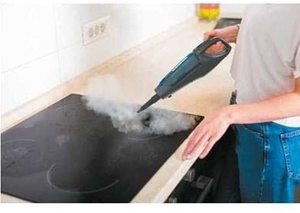 Hoover Steam Capsule 2-in-1 as a hand-held cleaning appliance.