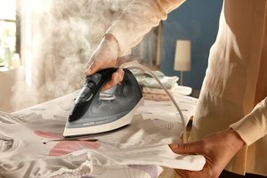 Philips Comfort Steam Iron in use.