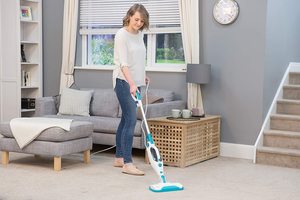 Russell Hobbs Neptune Multi Function Steam Mop in use.