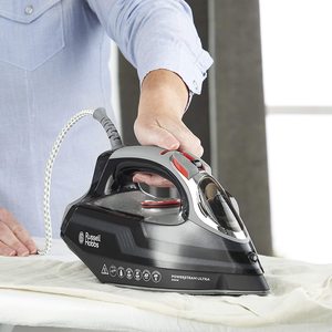 Russell Hobbs Powersteam Ultra Steam Iron in use.