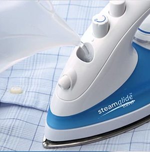 Filling the Russell Hobbs Travel Iron.