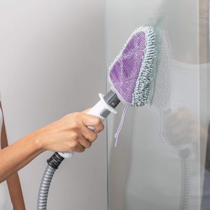 Shark S6005UK Steam Mop being used on a wall.