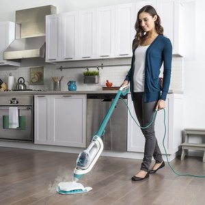 Vax Switch Steam Cleaner in use.