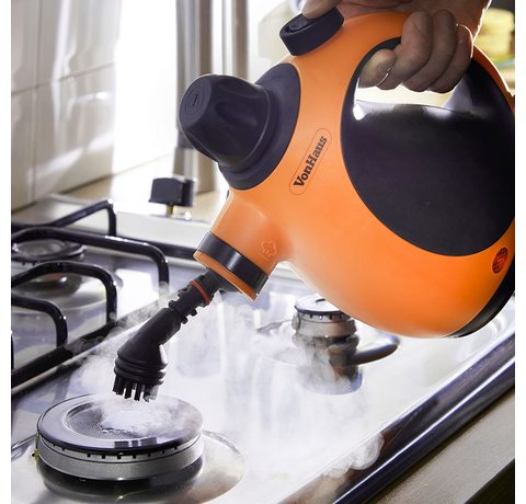 Cleaning an oven with the Vonhaus Handheld Steam Cleaner.